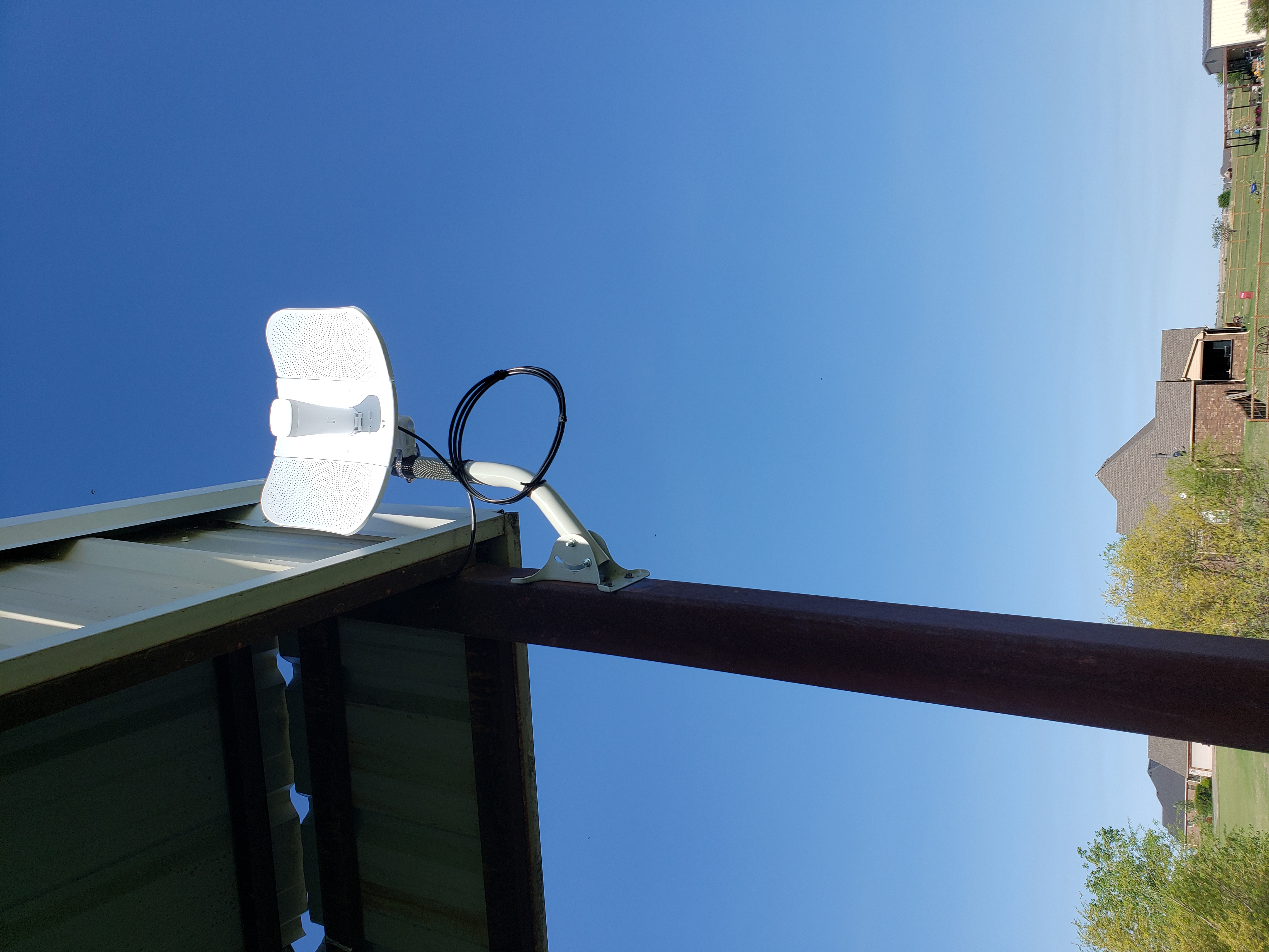 Wireless antenna mounted on a rooftop